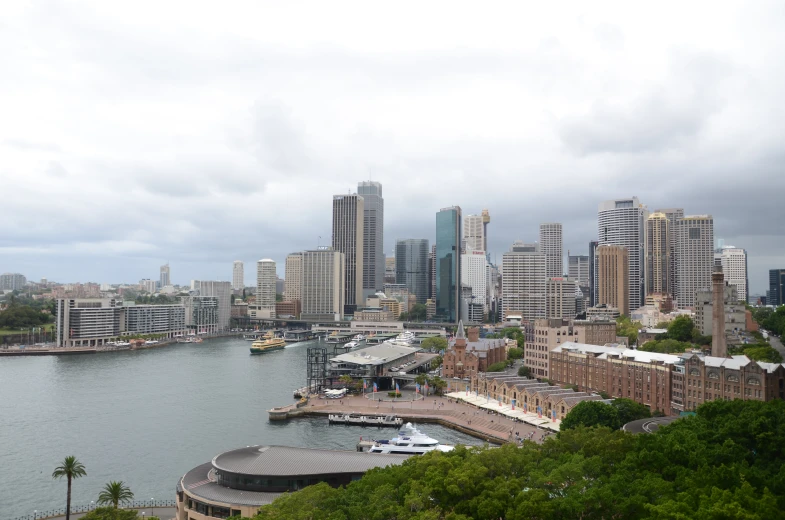 a city sits near the water as seen from a high angle