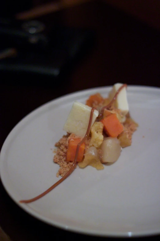 a white plate topped with an assortment of food