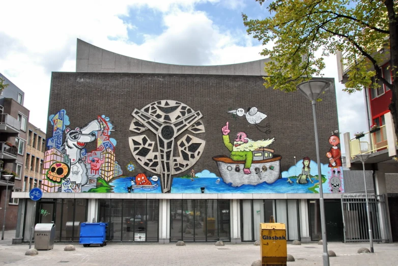 a building is decorated with an unusual mural