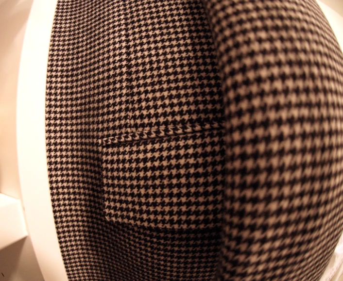 the backside of a jacket with houndswet print