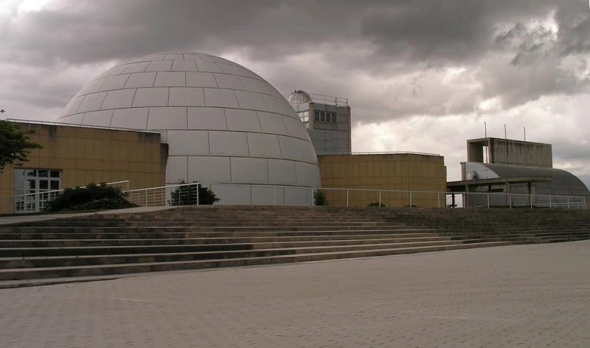 some concrete steps a building and a large dome