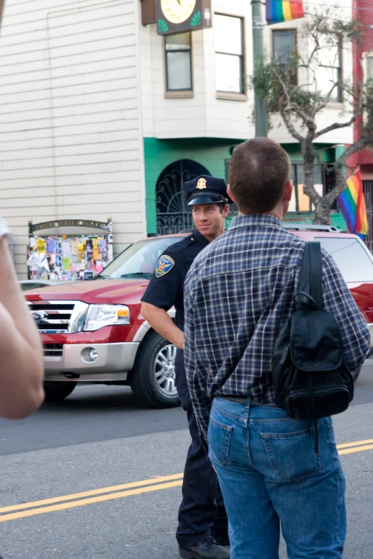 two cops standing near each other and talking to each other