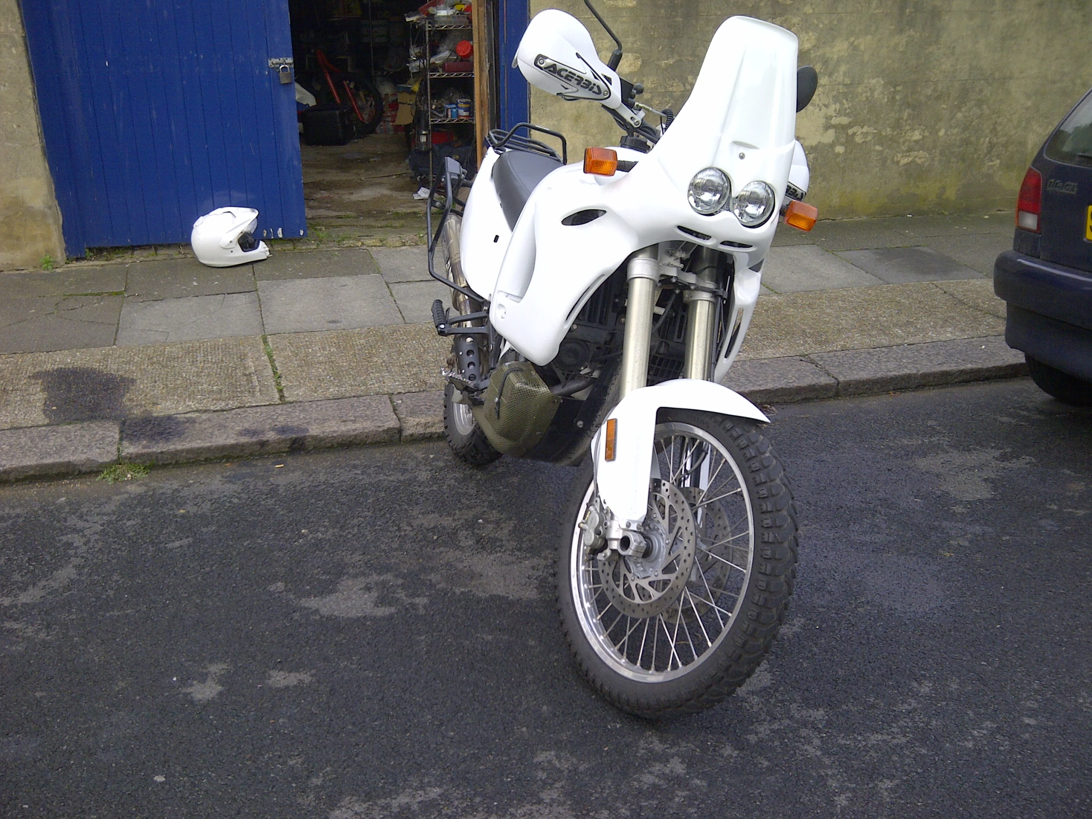 a motorcycle parked in front of a building