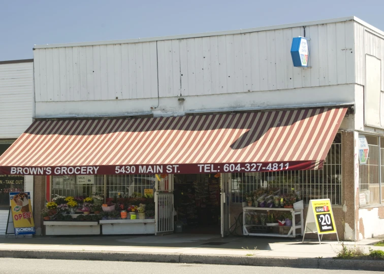 the flower shop is on the corner of the street