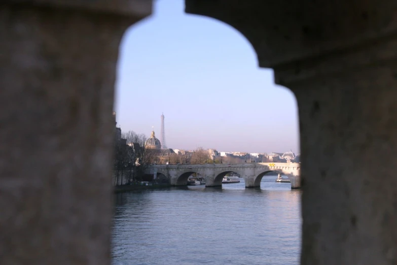 a bridge that is surrounded by some water