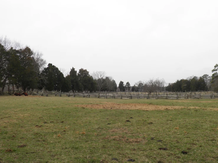 a large cemetery with cemetery benches on the side