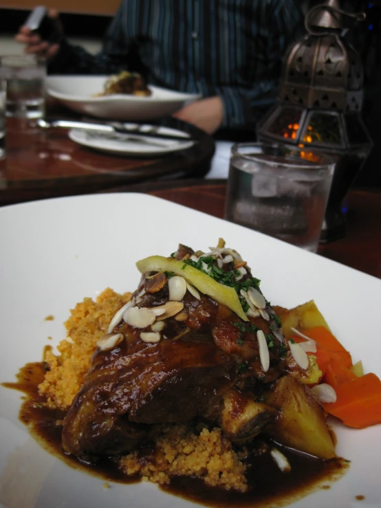 plate of food with a side of food on a table