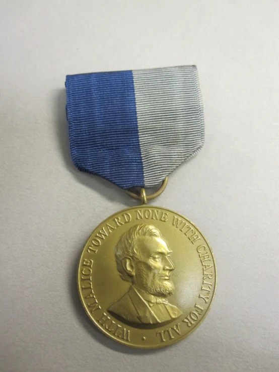 an official medal is on display on a table