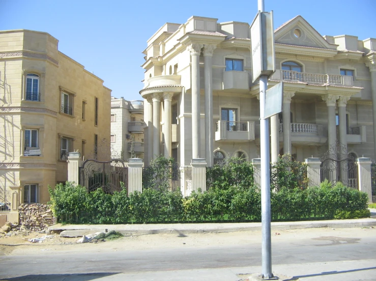 an old mansion on the corner of a street