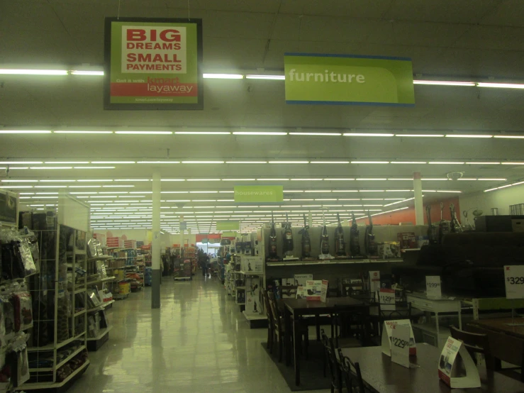 the interior of a furniture store and it is all on sale