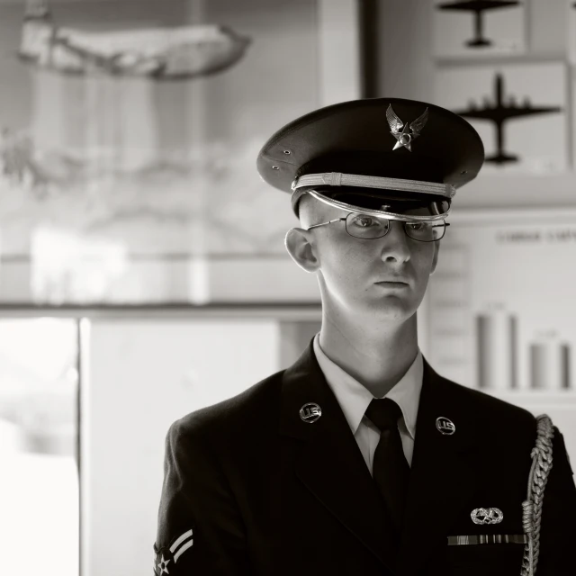black and white po of female in uniform