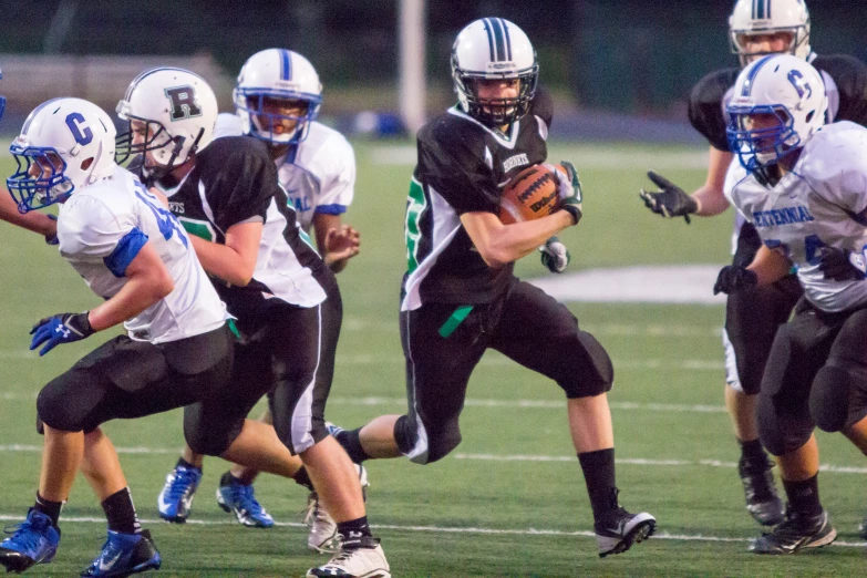 an action s of football on the field