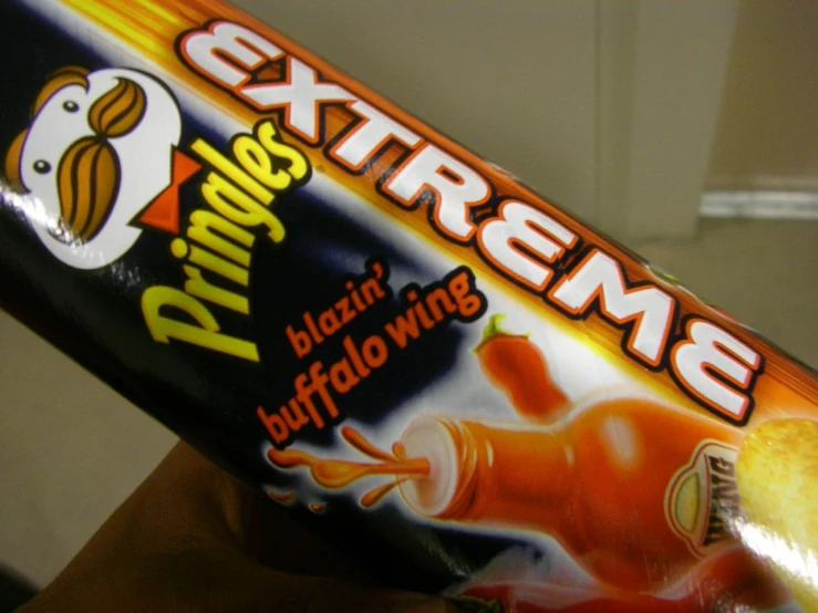 a chocolate bar being held by a person with the text extreme