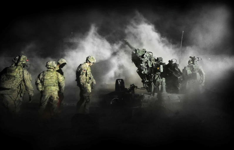 some soldiers standing with smoke coming out of them