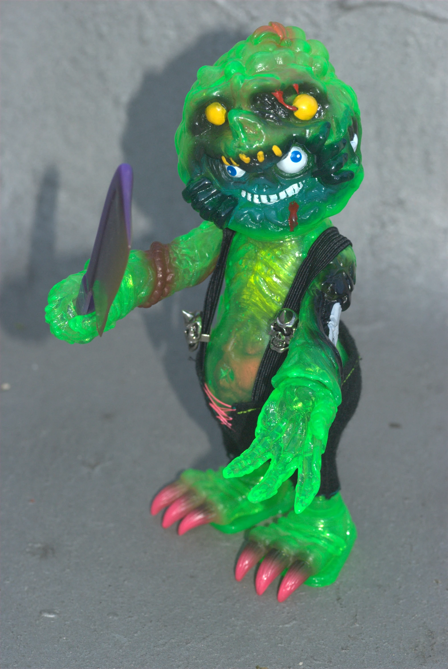 a toy that looks like an ugly green monster