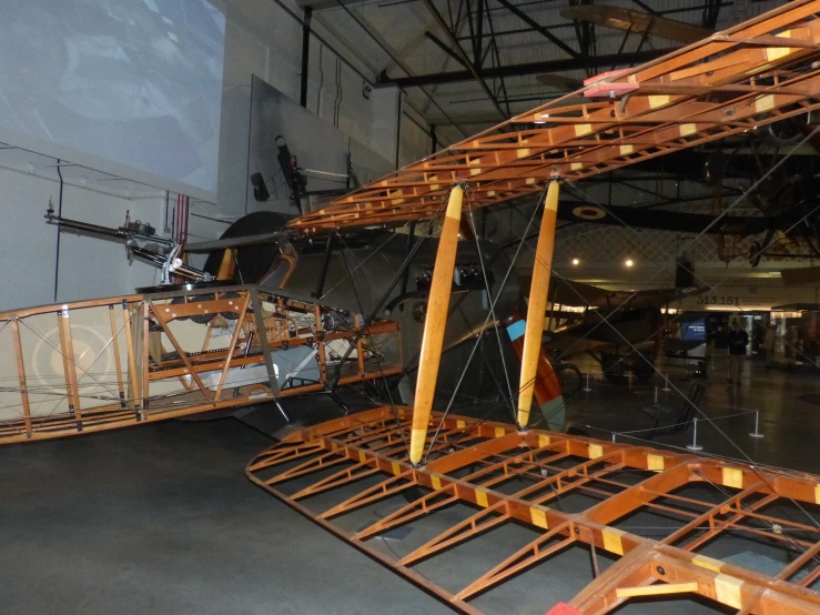 an image of two airplane displayed in a museum