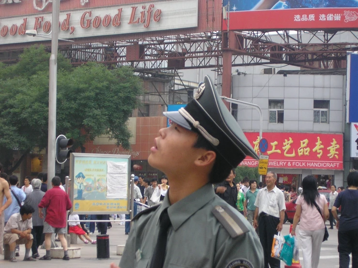 there is a cop that is standing in the street