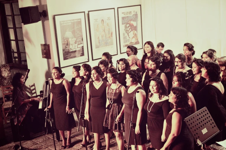 a group of women with singing instruments standing next to each other