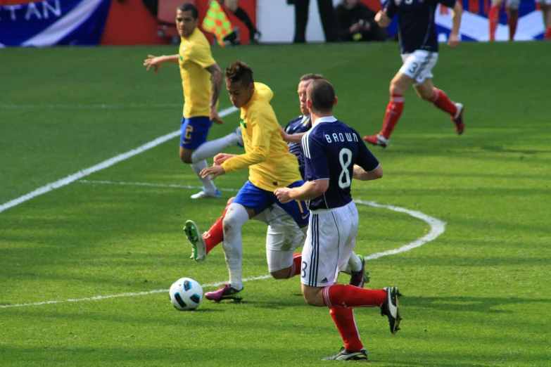 a group of soccer players are playing together