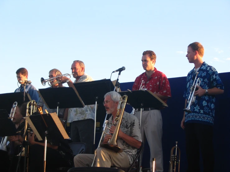 a group of men playing instruments on stage