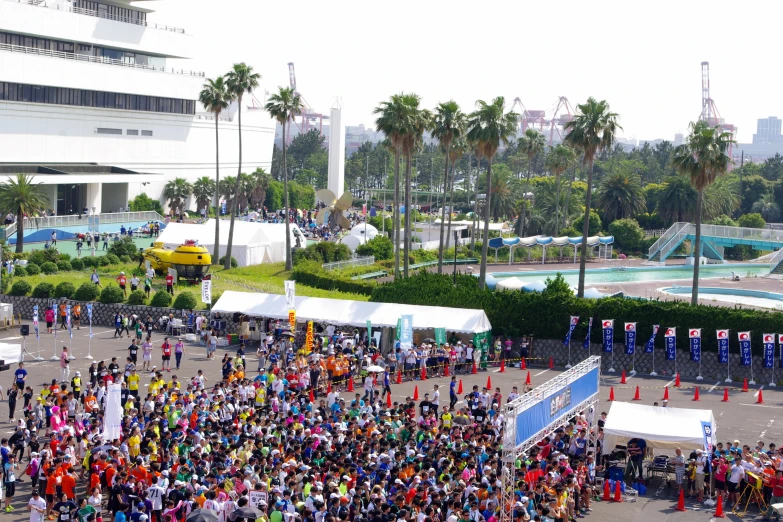 an outdoor event with a huge group of people