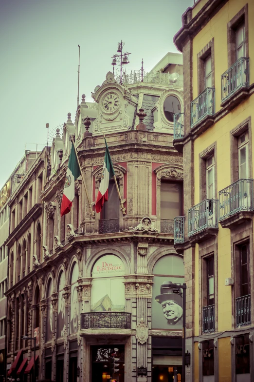 a row of buildings with flags of different countries on them