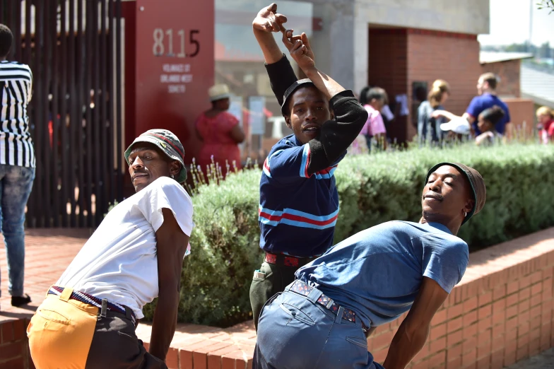 children playing frisbee in the city street