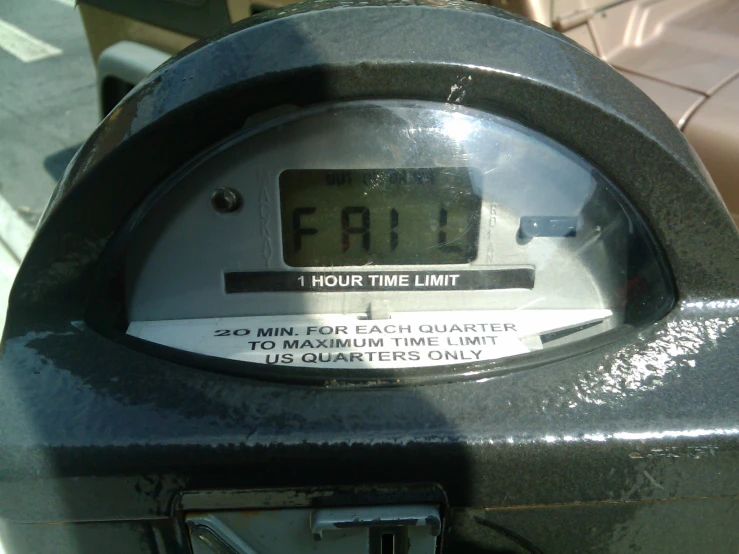 a parking meter with a digital timer on the top