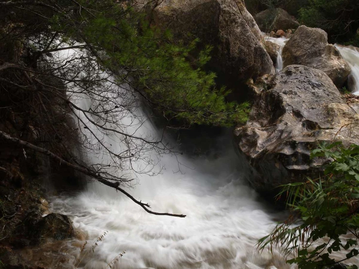 the water moves into a stream of white liquid