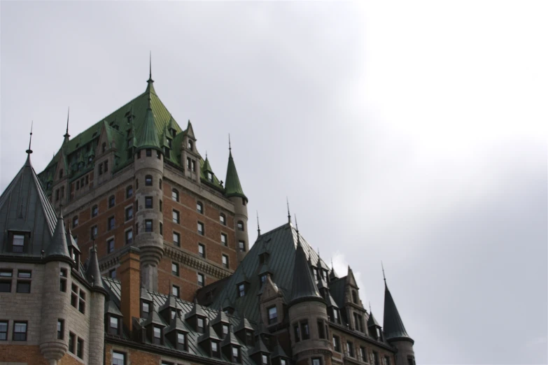 a tall building that is standing on top of a hill