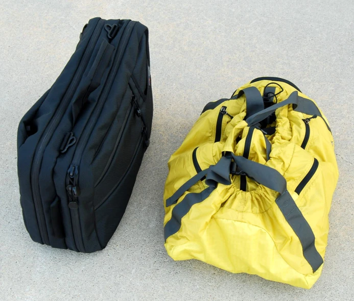 an empty bag is shown next to the smaller, large piece of luggage