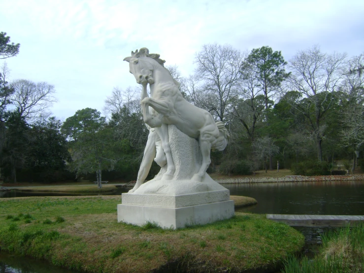 the white sculpture has a horse with a crown on its head