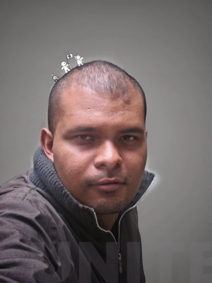 a man with a silver crown on top of his head