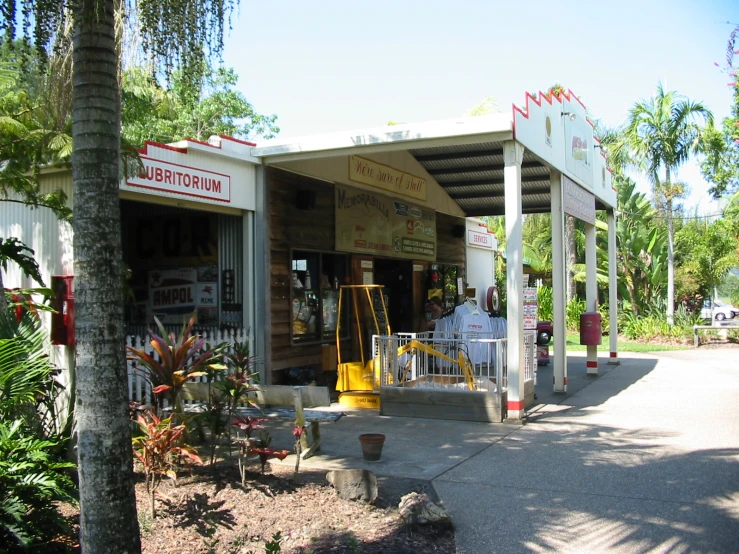 a small store is sitting out by the trees