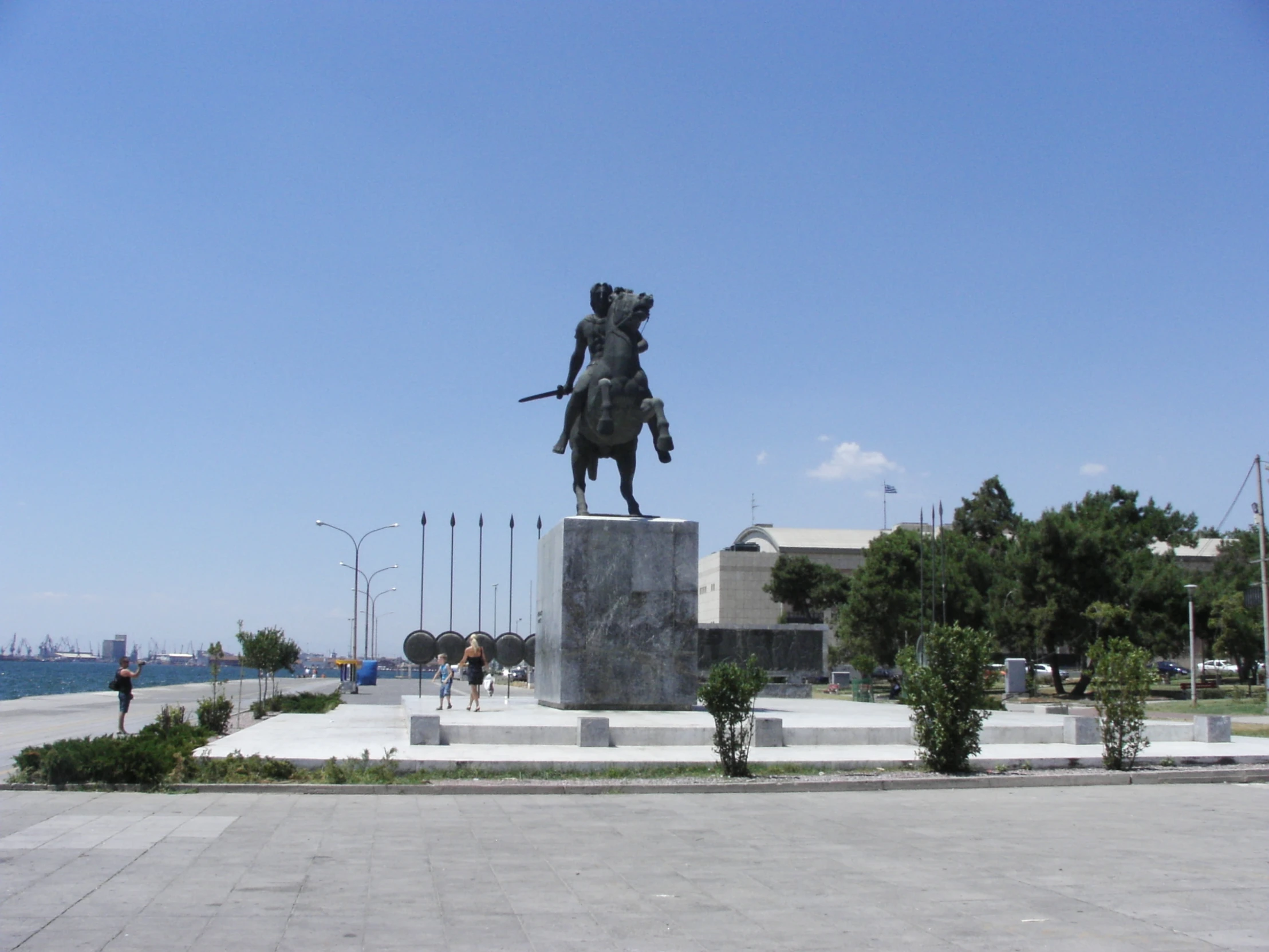 a statue of a man riding on top of a horse