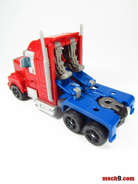 this toy truck has a red, white and blue front and sides