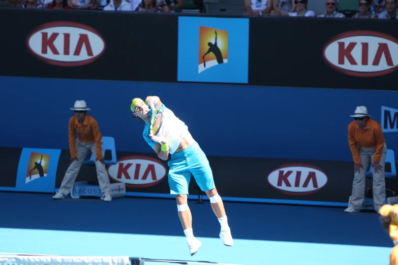 tennis player attempting to hit a tennis ball