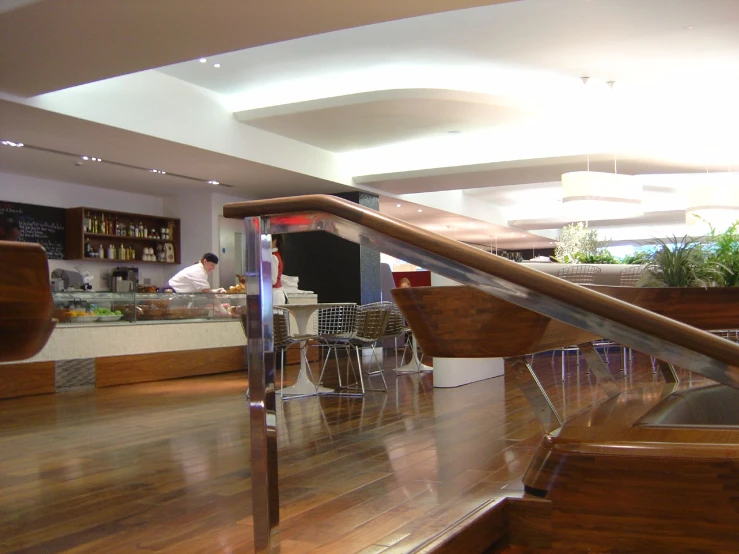 a restaurant with the stair railing open