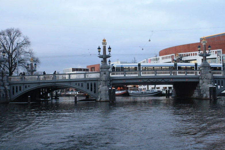 a bridge that is on the water in the day