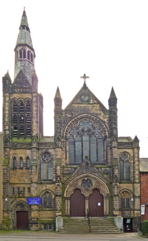 an old looking church with stained glass windows