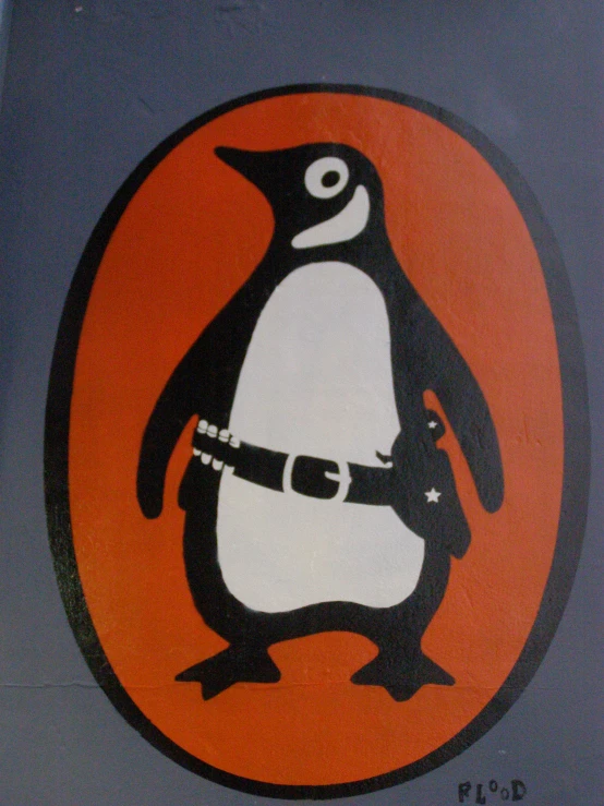 a round picture of a penguin holding a knife