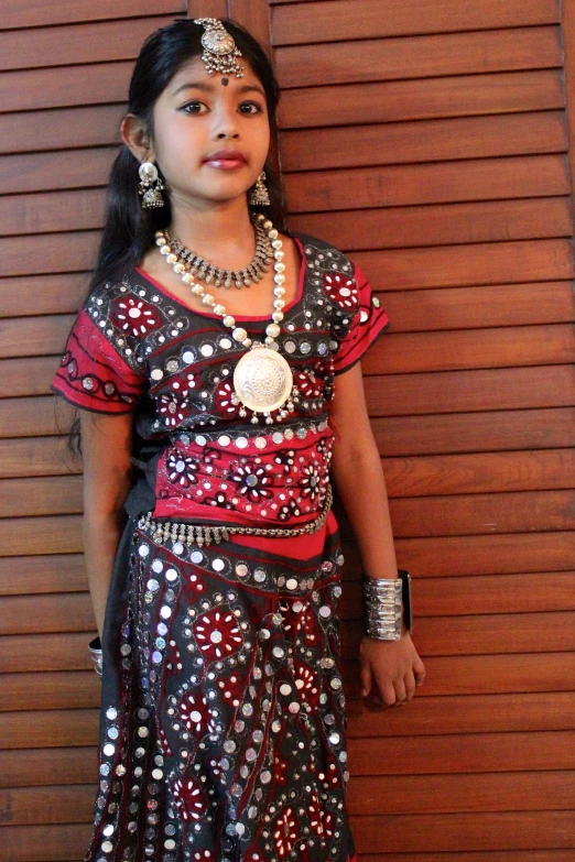 young indian girl dressed up in a traditional outfit
