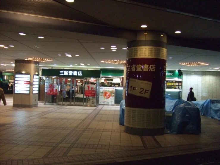 a large round object sits in a mall