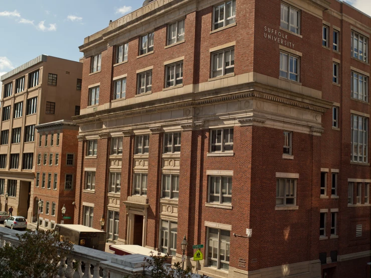 a closeup of a building and buildings, including a clock