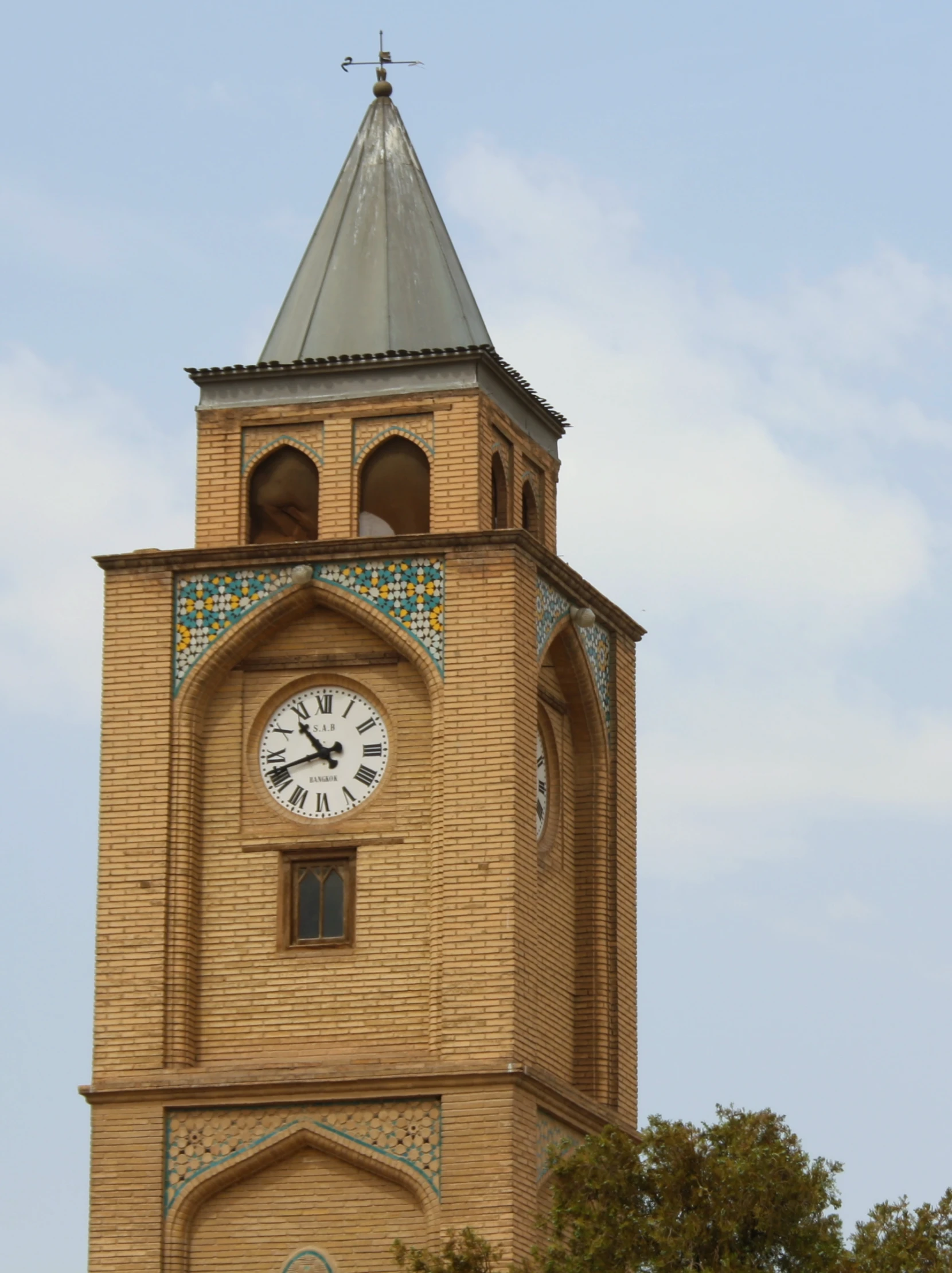 an ornate tower with a clock on it