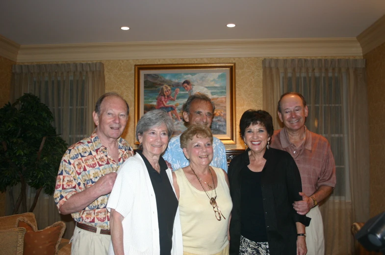 a group of people posing for a po together