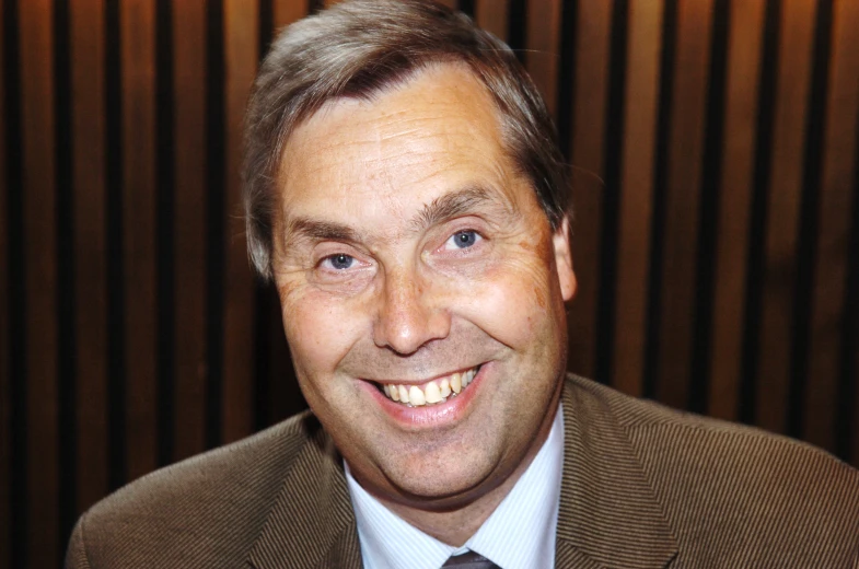 a man wearing a suit jacket and a tie