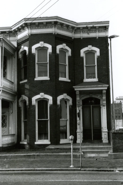 the large brick building has three stories on it