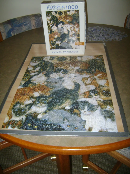 a puzzle sits on top of a table next to a chair