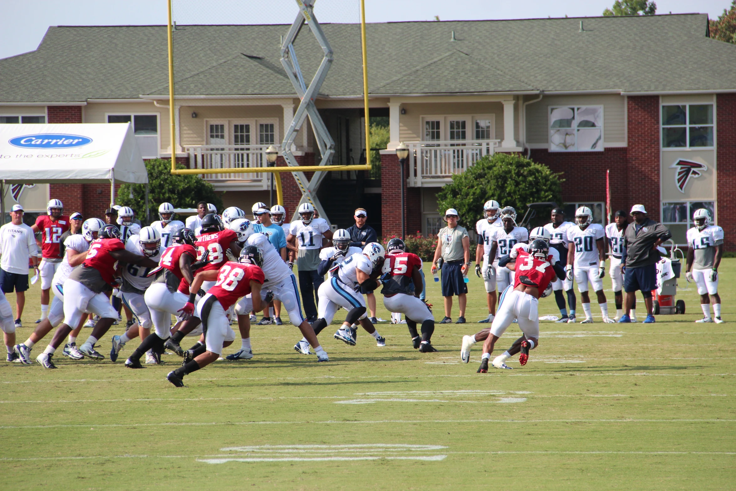 a football game with the players running down the field